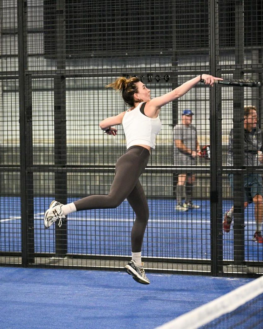 Player leaping at the net at Velocity Padel Widnes
